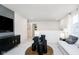 Cozy loft area with comfortable seating, modern decor, and ample natural light streaming through the windows at 2598 Penn Ave, Plainfield, IN 46168