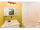 Bathroom with a bathtub and a vanity at 31 E Mill St, New Palestine, IN 46163