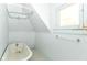 Bright bathroom featuring a classic tub, vintage fixtures, and natural light from the window, ideal for a relaxing bath at 31 E Mill St, New Palestine, IN 46163