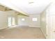 Bright living room featuring French doors, ample natural light, and neutral wall colors at 31 E Mill St, New Palestine, IN 46163