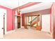 Dining room features painted walls, wood framed staircase, door and windows at 31 E Mill St, New Palestine, IN 46163
