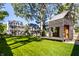 Expansive backyard with modern playhouse and landscaped lawn at 3215 N Pennsylvania St, Indianapolis, IN 46205