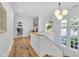 Bright hallway with natural light, wood floors, and stylish decor at 3215 N Pennsylvania St, Indianapolis, IN 46205