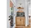 Hallway featuring a built-in cabinet with floating shelves, providing a convenient storage area at 3215 N Pennsylvania St, Indianapolis, IN 46205