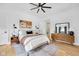 Bright main bedroom with hardwood floors and modern decor at 3215 N Pennsylvania St, Indianapolis, IN 46205