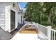 Relaxing rooftop deck with lounge chairs and white railings, perfect for enjoying sunny days and outdoor living at 3215 N Pennsylvania St, Indianapolis, IN 46205