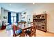Open concept living room featuring hardwood floors and natural wood furniture at 350 N Meridian St # A303, Indianapolis, IN 46204