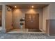 Building entrance featuring double doors, riser room door, and potted plants at 350 N Meridian St # A303, Indianapolis, IN 46204