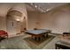 Spacious game room features a ping pong table and a doorway to another area at 350 N Meridian St # A303, Indianapolis, IN 46204