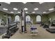 Well-lit gym with a variety of weight machines, free weights, and cardio equipment at 350 N Meridian St # A303, Indianapolis, IN 46204
