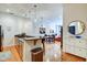 Open-concept kitchen with granite countertops, stainless appliances, flows to the living area at 350 N Meridian St # A303, Indianapolis, IN 46204