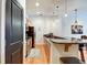 Modern kitchen features granite counters, stainless appliances, and wood floors at 350 N Meridian St # A303, Indianapolis, IN 46204
