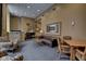 Comfortable lobby with a leather sofa, armchairs, and a piano at 350 N Meridian St # A303, Indianapolis, IN 46204
