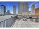 This terrace features a city view, outdoor seating and a built-in grill for entertaining at 350 N Meridian St # A303, Indianapolis, IN 46204