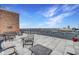Enjoy expansive rooftop views in this outdoor area with plenty of seating at 350 N Meridian St # A303, Indianapolis, IN 46204