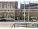 Classic brick buildings feature vintage architecture and street access in a vibrant city neighborhood at 350 N Meridian St # A303, Indianapolis, IN 46204