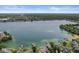 Scenic aerial view of lakefront properties with lush green surroundings at 3535 Clearwater Cir, Indianapolis, IN 46240