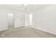 Empty bedroom featuring neutral walls, carpet, and doors, providing a clean and adaptable living area at 3535 Clearwater Cir, Indianapolis, IN 46240