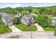 Inviting two-story home with manicured lawn, attached garage, and neatly landscaped front yard at 3535 Clearwater Cir, Indianapolis, IN 46240