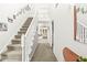 Open foyer with staircase, letting natural light in and providing a grand entrance to the home at 3535 Clearwater Cir, Indianapolis, IN 46240