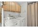Well-equipped laundry area with appliances and ample storage, making chores convenient and organized at 3535 Clearwater Cir, Indianapolis, IN 46240