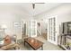 Living room featuring a ceiling fan, french doors and neutral decor at 3535 Clearwater Cir, Indianapolis, IN 46240