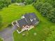 Bird's eye view of a home with a large backyard, patio, and surrounding greenery at 3564 Clear Creek Blvd, Martinsville, IN 46151
