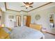 Bedroom featuring two dressers, a ceiling fan, and an ensuite bathroom at 3564 Clear Creek Blvd, Martinsville, IN 46151