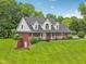 A view of the home showing a side entrance and landscaping at 3564 Clear Creek Blvd, Martinsville, IN 46151
