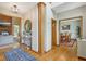 Foyer with hardwood floors, wooden column, and views to other rooms at 3564 Clear Creek Blvd, Martinsville, IN 46151