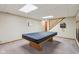 The expansive, carpeted game room offers ample space for a pool table and entertainment at 3564 Clear Creek Blvd, Martinsville, IN 46151