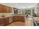 Well-equipped kitchen boasts stainless steel appliances, granite countertops, and ample cabinet space at 3564 Clear Creek Blvd, Martinsville, IN 46151