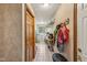 Laundry room featuring washer, dryer, storage shelves, and coat hooks at 3564 Clear Creek Blvd, Martinsville, IN 46151