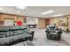 Relax in this living room with comfortable seating, a kitchenette, and workout space at 3564 Clear Creek Blvd, Martinsville, IN 46151