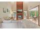 Spacious living room with brick fireplace and open layout to dining area at 3564 Clear Creek Blvd, Martinsville, IN 46151
