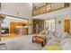 Spacious living room features vaulted ceilings, a cozy fireplace, and an open floor plan at 3564 Clear Creek Blvd, Martinsville, IN 46151