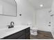 Bathroom featuring modern vanity, new tile floors, and a shower with sleek fixtures at 374 Pomona Ct, Greenfield, IN 46140