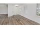 Bright entryway featuring wood-look floors, natural light, and a simple, modern aesthetic at 374 Pomona Ct, Greenfield, IN 46140