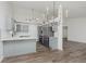 Open kitchen with stainless steel appliances, sleek countertops, and modern lighting at 374 Pomona Ct, Greenfield, IN 46140