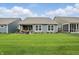 View of the backyard showing the covered patio at 395 Ehrlich Ln, Westfield, IN 46074