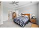 Cozy main bedroom featuring a queen-sized bed, dresser, and ensuite bath at 395 Ehrlich Ln, Westfield, IN 46074