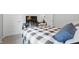 Cozy bedroom features a black metal bedframe, grey carpet and a flat screen television at 395 Ehrlich Ln, Westfield, IN 46074
