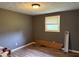Simple bedroom with a window providing natural light and ample space for customization and decor at 409 W 3Rd St, Alexandria, IN 46001