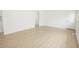 Spacious room features laminate floors, creating a modern and welcoming space at 412 S Norfolk St, Indianapolis, IN 46241