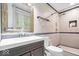 Bathroom featuring a modern vanity, walk-in shower, and neutral tiling at 434 Verwood Ct, Indianapolis, IN 46234