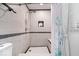 Updated bathroom with walk-in shower, contemporary fixtures, and neutral tile at 434 Verwood Ct, Indianapolis, IN 46234