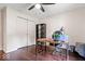 Bedroom features a closet, shelving, ceiling fan, and hardwood floors at 434 Verwood Ct, Indianapolis, IN 46234