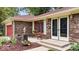Close-up of the charming front porch with brick detail and inviting double-door entry at 434 Verwood Ct, Indianapolis, IN 46234