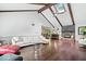 Spacious living room featuring high ceilings, wood beams, fireplace and hardwood floors at 434 Verwood Ct, Indianapolis, IN 46234