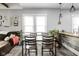 Dining area with natural light, view of the kitchen and open concept living space at 4414 Winthrop Ave, Indianapolis, IN 46205